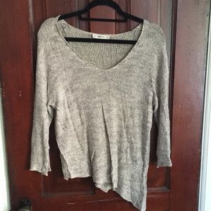 Lightweight scoop neck asymmetrical knit top